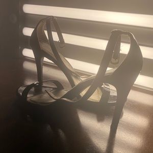 Strapped black open toe pump